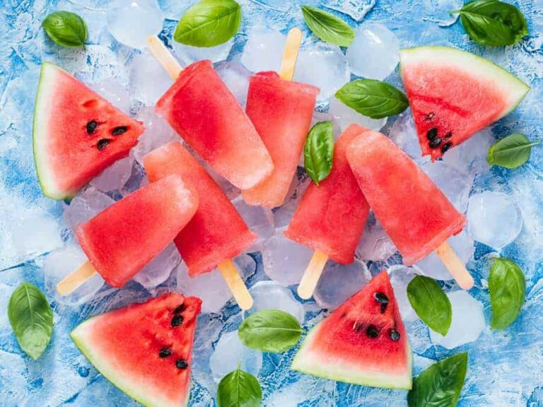 Photo of watermelon popsicles and watermelon on ice from "Red Watermelon Rush Popsicle" recipe by Green Smoothie Girl