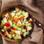 Photo of cut apples, celery, and raisins on plate from "Waldorf Salad" recipe by Green Smoothie Girl
