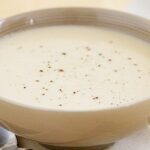 Photo of light beige soup in light brown bowl from "15 Post-Workout Green Smoothies For Faster Recovery" by Green Smoothie Girl