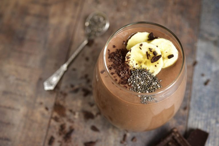 Photo of chocolate smoothie in glass with bananas and chia seeds from "Chocolaty Breakfast Smoothie" recipe by Green Smoothie Girl