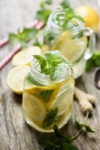 Photo of mason jars with lemon and mint water from "{VIDEO} Why Are You Afraid of Detoxing?" by Green Smoothie Girl