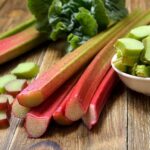 Rhubarb on wooden table.