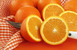 Photo of freshly cut oranges, from "Natural Treatments for Urinary Tract Infections (UTIs)" at Green Smoothie Girl.