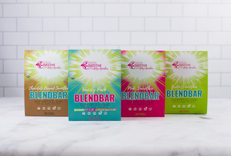 Photograph of Blendbar boxes on a white marble countertop, from Green Smoothie Girl.