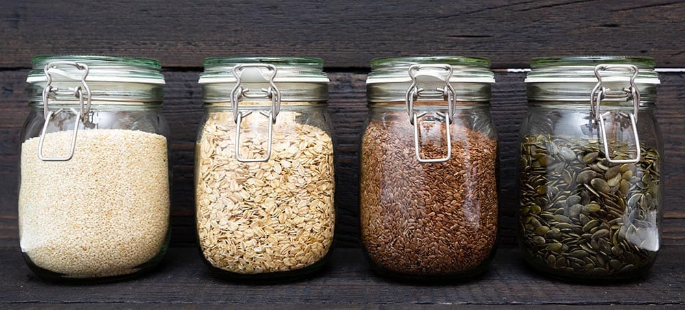 various seeds in storage jars