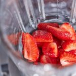 fresh strawberries in a blender