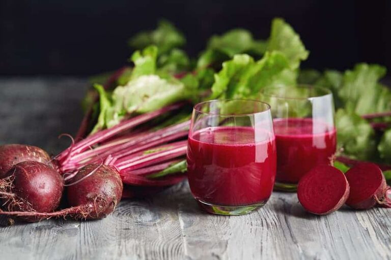 Photo of hot pink beet smoothie and beets from "Green Smoothies For Crohn’s Disease: Research And Recipes" by Green Smoothie Girl