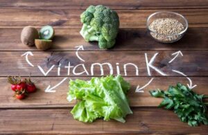 Photo of vegetables, fruits, and grain with vitamin K written on table from "What Really Causes Cavities, and What Can You Do to Prevent Them?" by Green Smoothie Girl