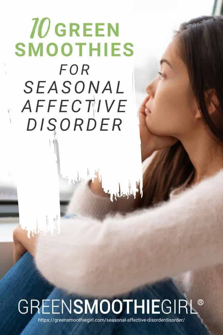 Photo of sad Asian woman looking out window with post's title text overlay from "10 Green Smoothies For Seasonal Affective Disorder" by Green Smoothie Girl