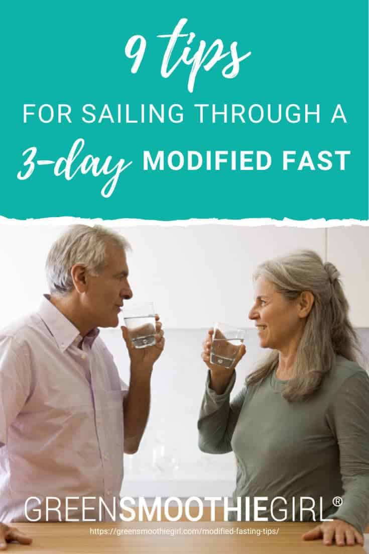 Photo of mature couple smiling at each other and drinking water in kitchen with post's title text overlay from "9 Tips For Sailing Through a 3-Day Modified Fast" blog post by Green Smoothie Girl