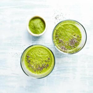 Photo of top-view green smoothie with chia seeds on top from "9 Green Smoothies For Clear, Younger-Looking Skin From The Inside Out" by Green Smoothie Girl