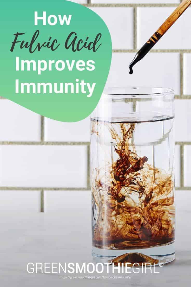 Photo of dropper of dark fulvic acid liquid being dropped and suspended in clear water with post's title text overlaid from "How Fulvic Acid Improves Immunity" blog post by Green Smoothie Girl