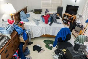 Photo of messy cluttered room from "Autophagy The Easy Way: How To Induce Autophagy Without Going Hungry" blog post by Green Smoothie Girl