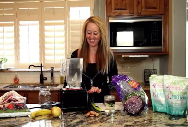 Photo of Robyn Openshaw blending a smoothie from "[Demo] The Only Green Smoothie Recipe You'll Ever Need: The Green Smoothie Template!" blog post by Green Smoothie Girl
