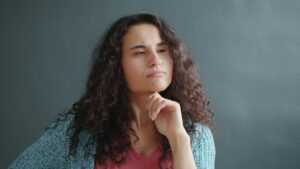 Person thoughtfully researching health decisions about peptides and safety