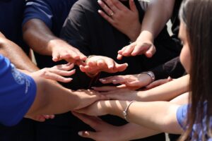 Hands in a circle, community support